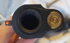 A person wielding a gun, highlighting the potential consequences of lax legislation on personal firearm ownership and the need for responsible tech solutions.