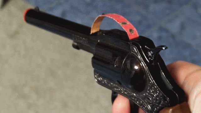 Animated cap pistol
