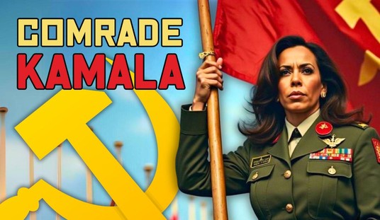 A woman in military attire holds a flag beside a hammer and sickle symbol with the text "Comrade Kamala" in bold letters on the left side of the image.