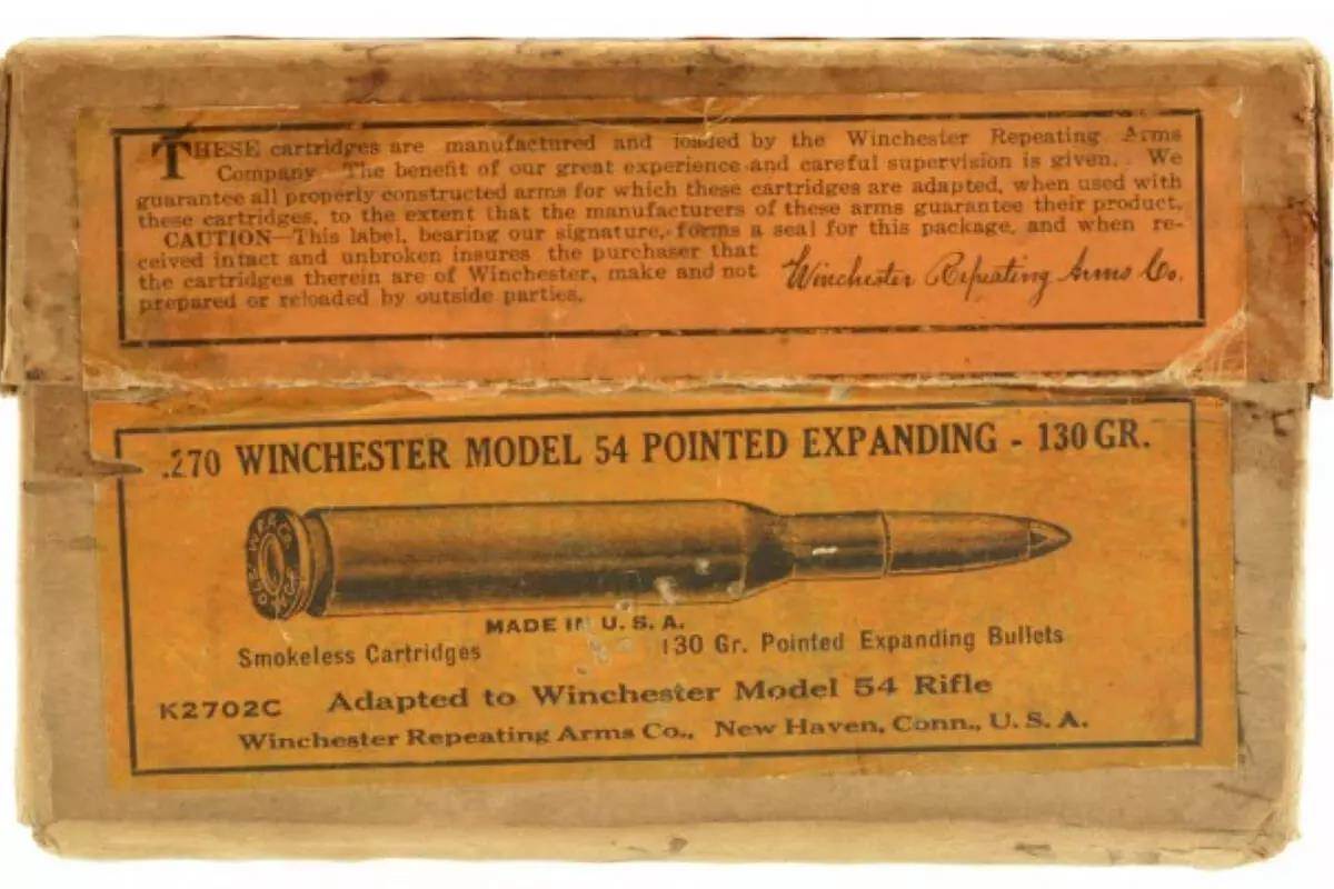 Old Winchester .270 ammo box with labels detailing cartridge specs: Model 54 Pointed Expanding 130 Gr. Includes caution and manufacturing details by Winchester Repeating Arms Co.