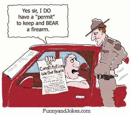 A man in a car shows a police officer the US Constitution, claiming it as his permit to bear a firearm.