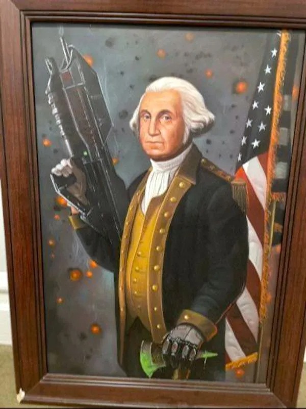 A framed painting of George Washington holding a large futuristic weapon, with a robotic hand, standing in front of an American flag.