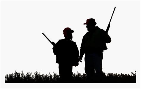 Silhouette of two people wearing caps holding rifles, standing outdoors in a grassy area.