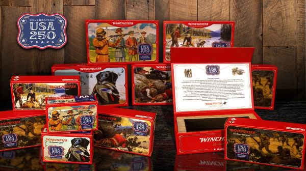 Display of Winchester ammunition boxes with historical and hunting-themed artwork, labeled with "USA 250 Years" celebrating America's 250th anniversary.